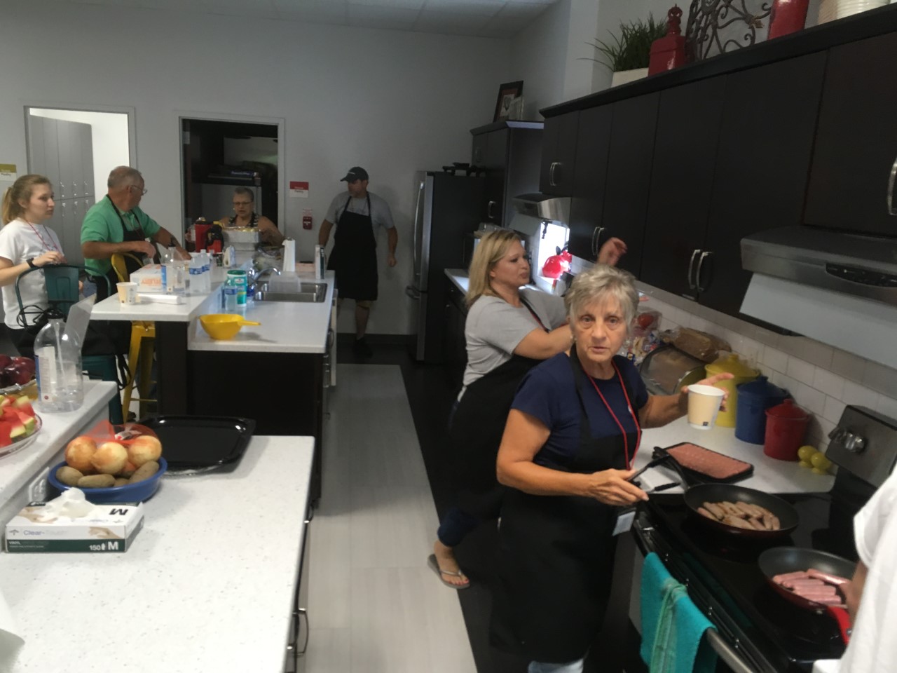 Foundation volunteers gathered during a Ronald McDonald House meal service