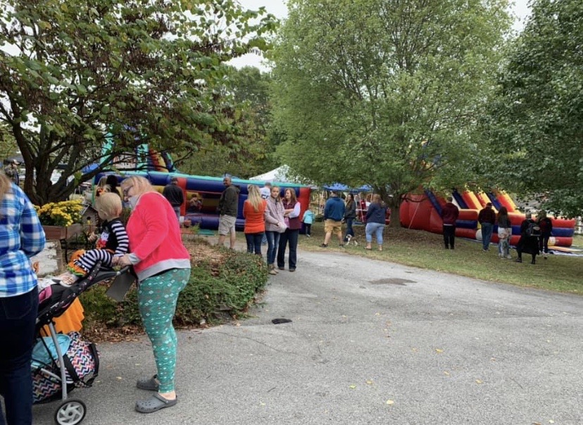 Families gather near activities at Lindsey’s Fall Festival